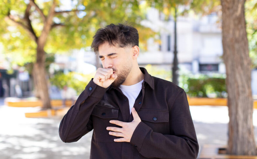 man choking