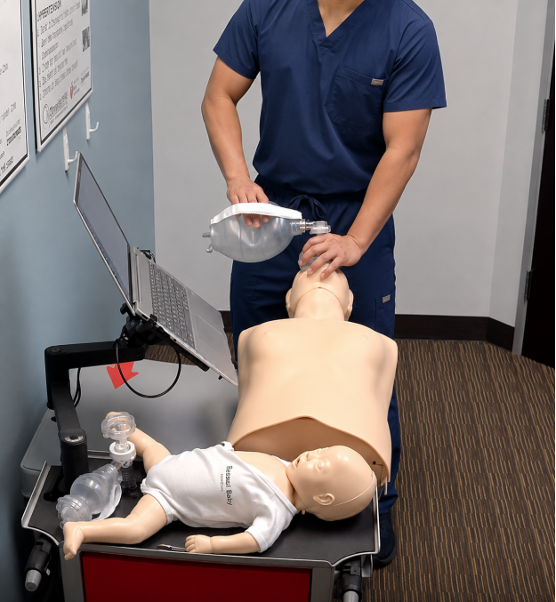 Provider performing adult ventilations during a self-guided ACLS skills session