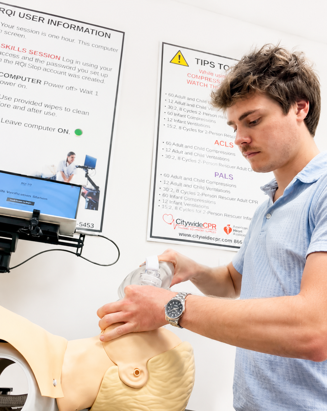 Healthcare professional performing ventilations during a CPR skills session