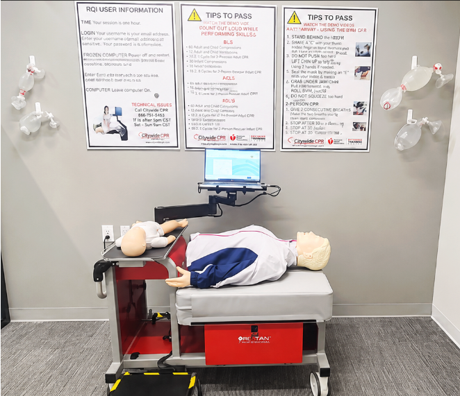 Healthcare professional performing CPR on an adult manikin during a Self-Guided Skills Session at a CPR Verification Station.