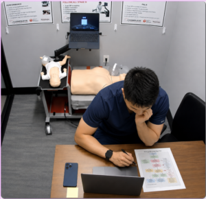 Healthcare professional completing an American Heart Association BLS skills session after finishing HeartCode BLS online coursework.