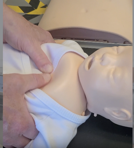 Thumbnail for the Infant CPR Compressions skills demonstration video.